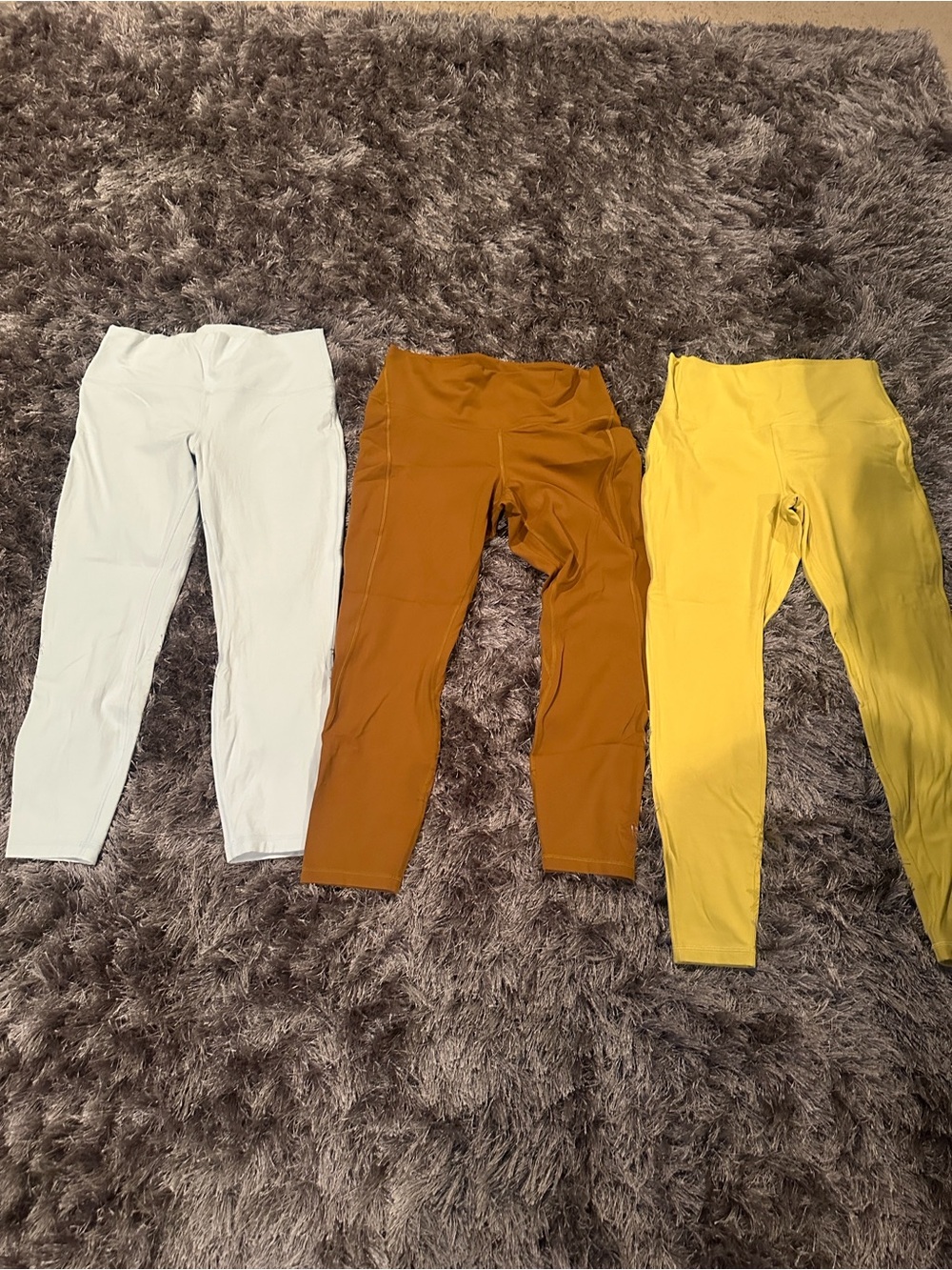Lululemon leggings mustard/brown pair only size 12 like new